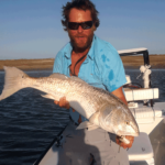 Port Aransas Texas, fly fishing, rockport, corpus christi, red, drum, redfish, sight casting, guide, charters, adventure, things to do in, flats, hatch outdoors, airflo, fly lines, beavertail skiffs, bull, red, record